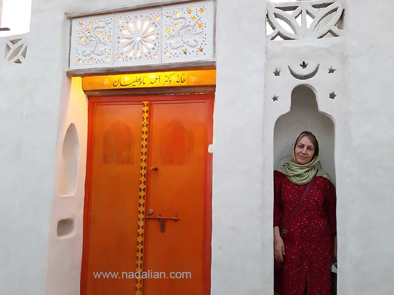 Atal Manshadi the wife of Ahmad Nadalian in front of the House in Laft Qeshm Island