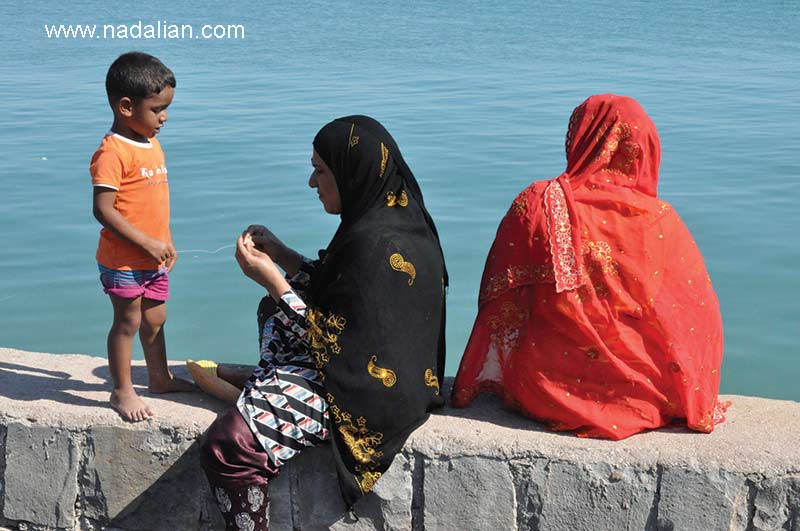 Children and women on the coast of Hormuz Island