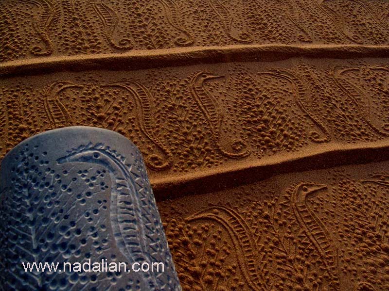 Print of Seahorse by Ahmad Nadalian's cylindrical seals on the sand beach, Hormuz Island